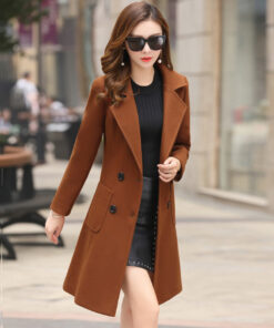 The vintage windbreaker pulls in the knee-length tweed coat